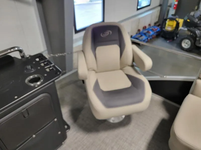 Slide: The Image of 2024 Barletta Aria A22CC captain's chair in a modern boat interior. - 14