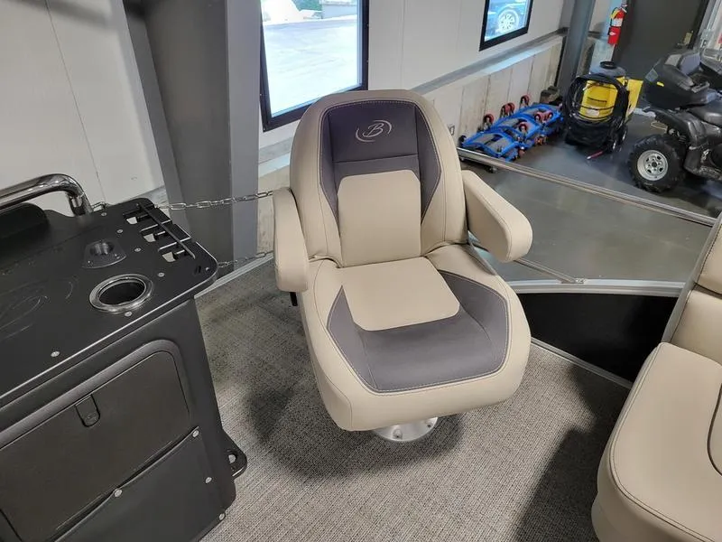 Slide: The Image of 2024 Barletta Aria A22CC captain's chair in a modern boat interior. - 15