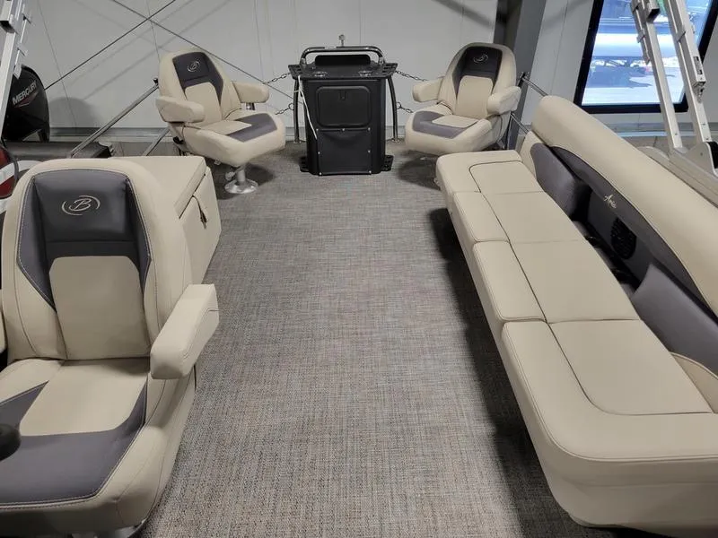 Slide: The Image of 2024 Barletta Aria A22CC boat interior with beige seating and modern design. - 19