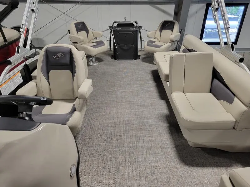 Slide: The Image of 2024 Barletta Aria A22CC boat interior with beige seating and modern design. - 20
