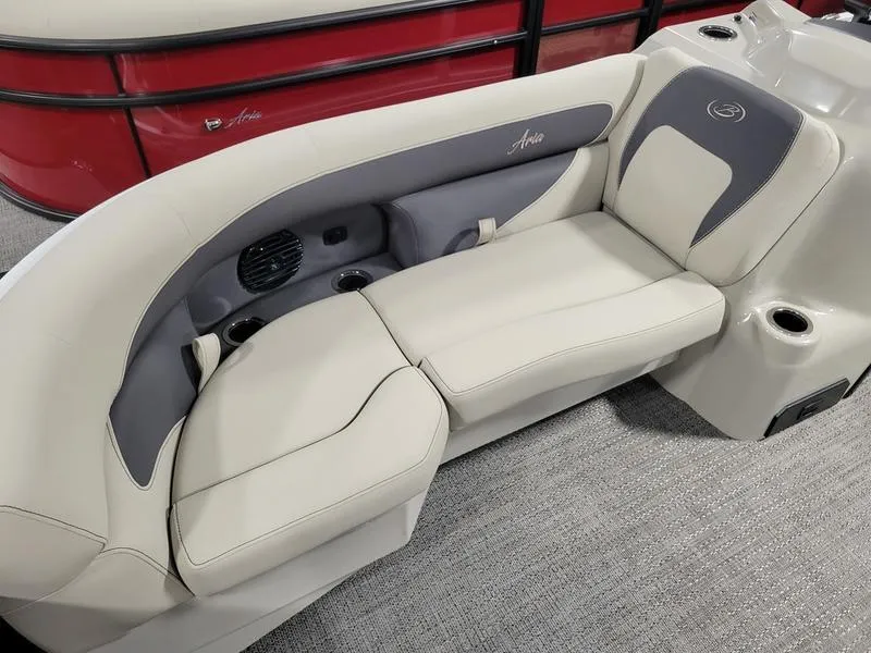 Slide: The Image of 2024 Barletta Aria A22CC boat interior with beige and gray seating. - 4