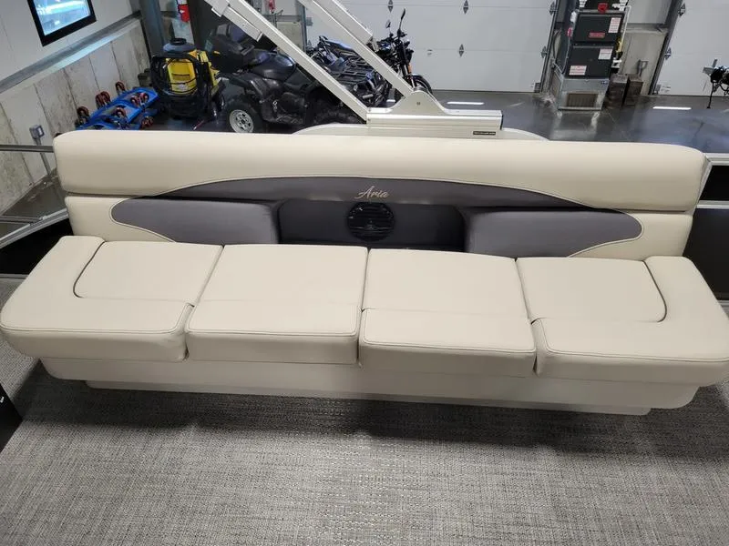 Slide: The Image of 2024 Barletta Aria A22CC boat interior seating, featuring beige upholstery and modern design. - 6