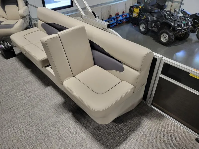 Slide: The Image of 2024 Barletta Aria A22CC boat interior with beige seating and modern design. - 8