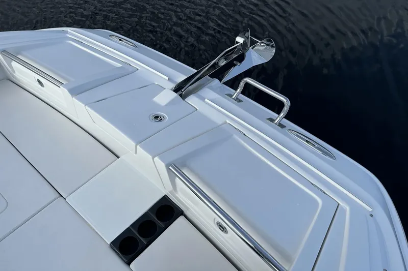 Slide: The Image of Aquila 32 Sport 2023 boat deck with anchor and storage compartments. - 9