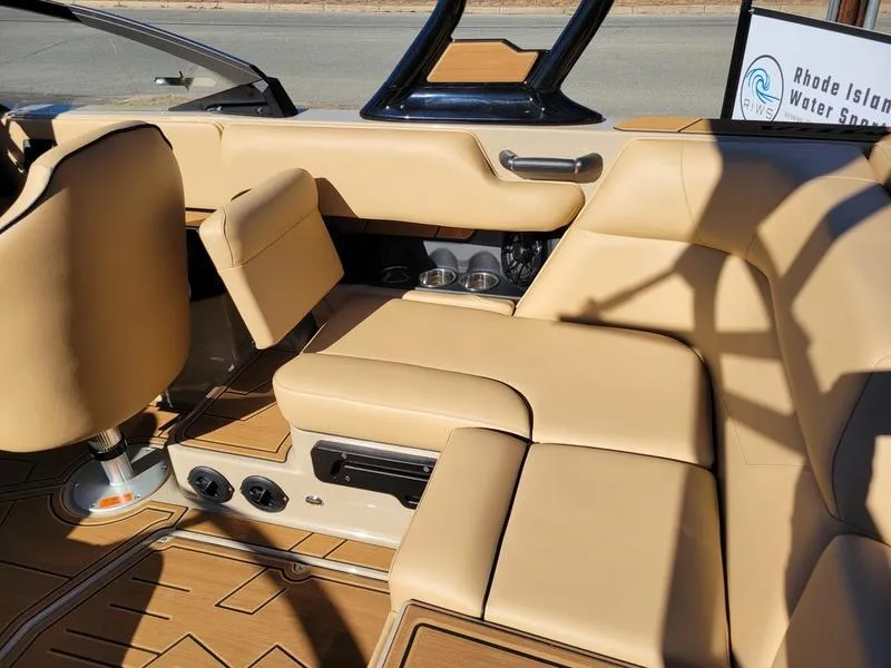 Slide: The Image of 2024 Moomba Mondo boat interior with tan leather seats and modern design. - 37