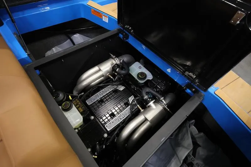 Slide: The Image of 2024 Axis T250 boat engine compartment with open hatch. - 15