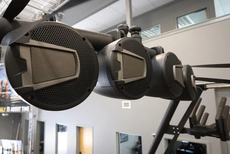 Slide: The Image of Close-up of Axis T250 2024 model gym equipment speakers in a modern fitness center. - 6