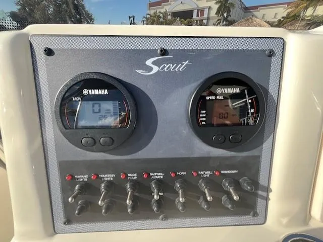 Slide: The Image of 2024 Scout 175 Sportfish dashboard with Yamaha tachometer and speedometer. - 11