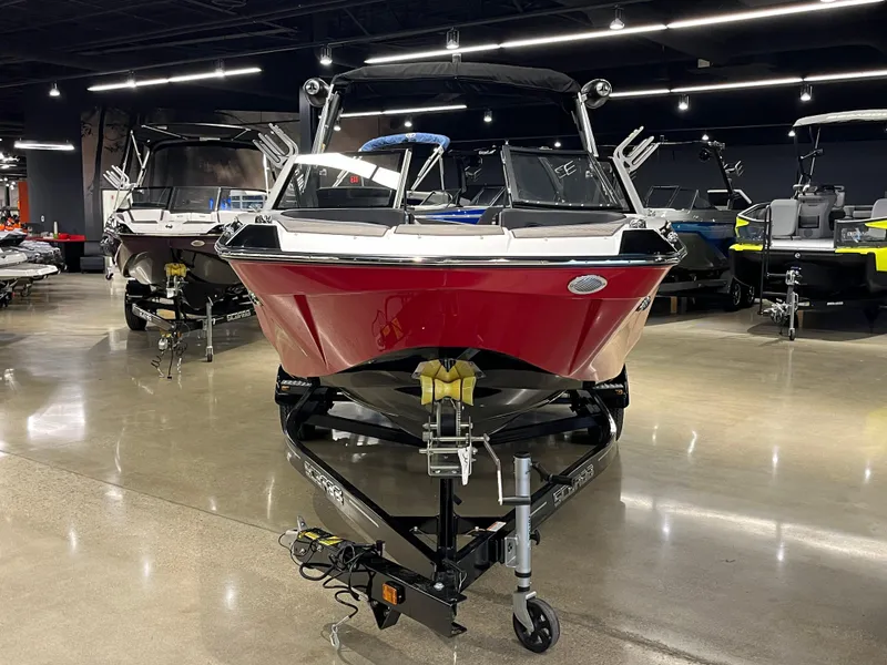 Slide: The Image of 2024 Scarab 235 Wake ID boat in showroom, front view. - 4