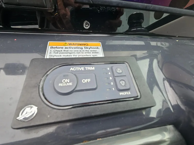 Slide: The Image of Active trim control panel on 2018 Formula 350 Sun Sport boat dashboard. - 25