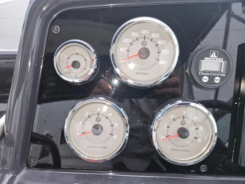 Slide: The Image of Dashboard gauges of a 2018 Formula 350 Sun Sport boat. - 31