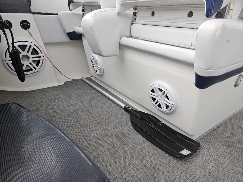Slide: The Image of Interior of 2018 Formula 350 Sun Sport boat with speakers and paddle. - 33