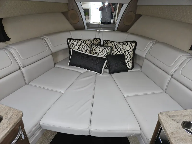 Slide: The Image of 2018 Formula 350 Sun Sport interior with plush seating and decorative pillows. - 42