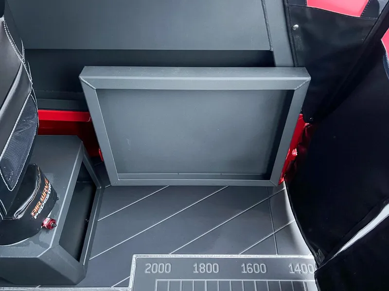 Slide: The Image of Interior of 2024 Stabicraft 2250 Alpha Ultra Centrecab with storage compartment. - 16