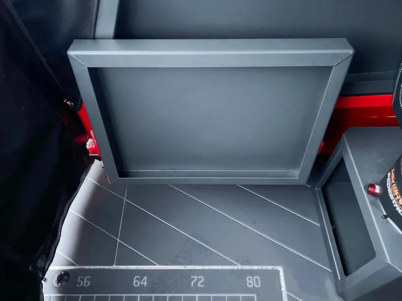 Slide: The Image of Interior of 2024 Stabicraft 2250 Alpha Ultra Centrecab with storage compartment. - 18