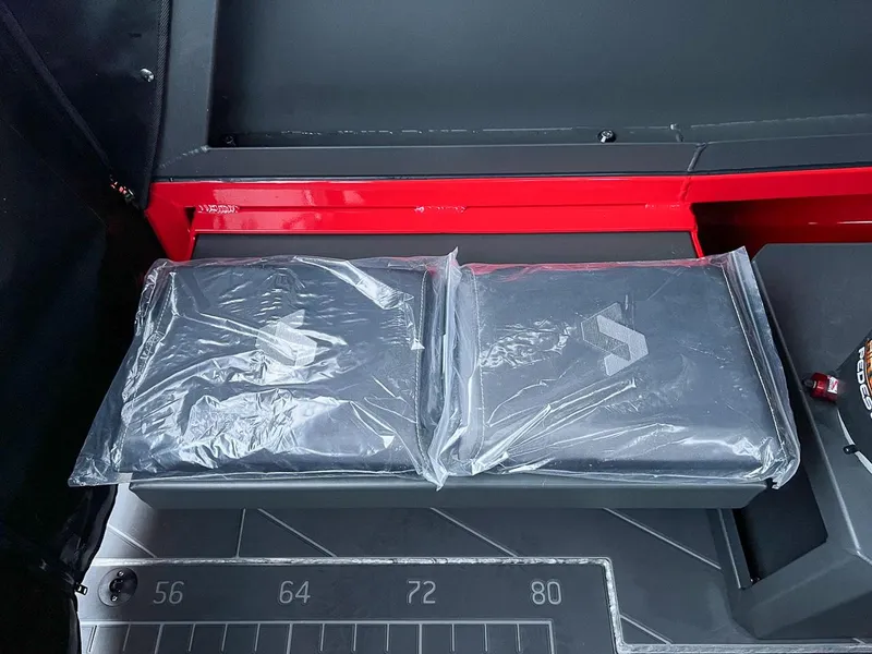 Slide: The Image of Stabicraft 2250 Alpha Ultra Centrecab 2024 interior with packaged accessories. - 19