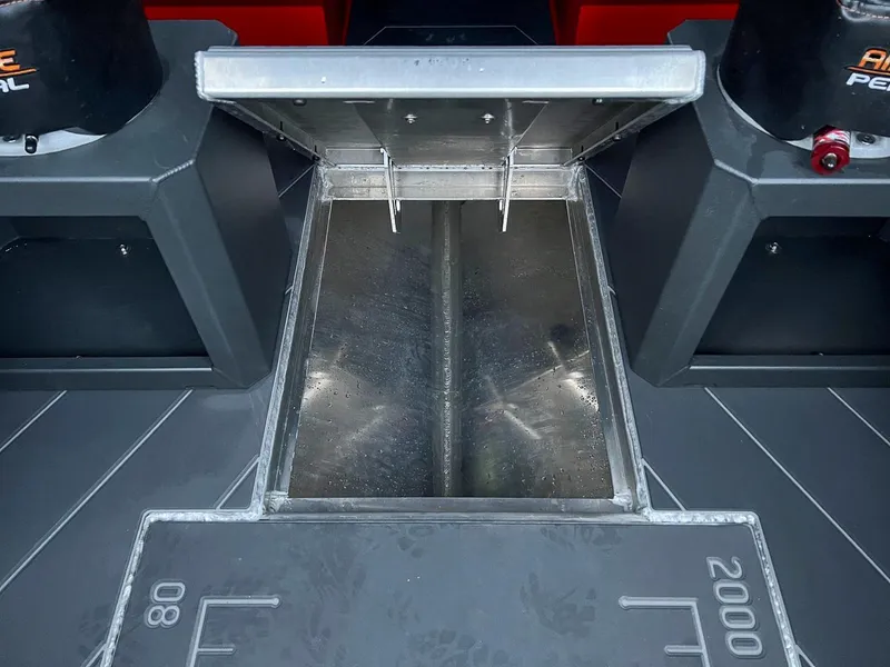 Slide: The Image of Open storage compartment on the 2024 Stabicraft 2250 Alpha Ultra Centrecab boat. - 20