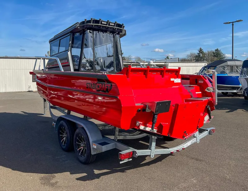 Slide: The Image of 2024 Stabicraft 2250 Alpha Ultra Centrecab boat on a trailer, rear view. - 5