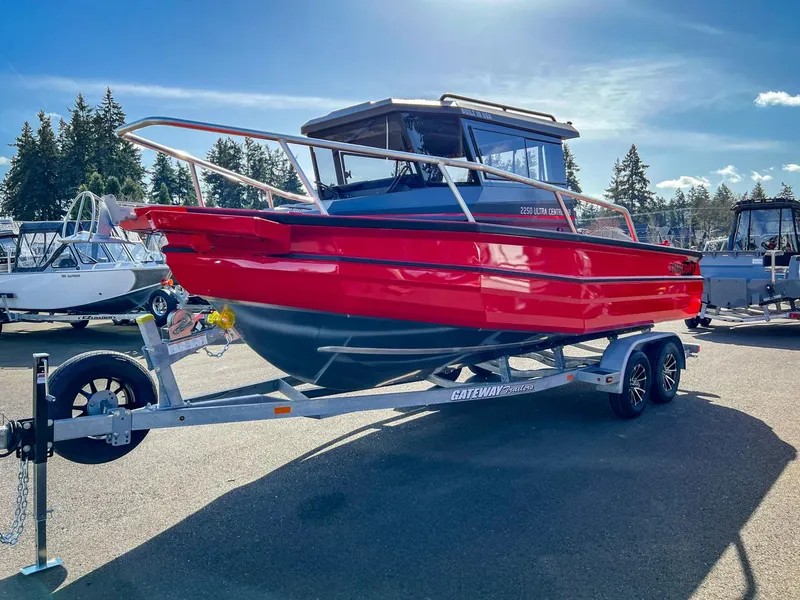 Slide: The Image of 2024 Stabicraft 2250 Alpha Ultra Centrecab boat on trailer in outdoor setting. - 6