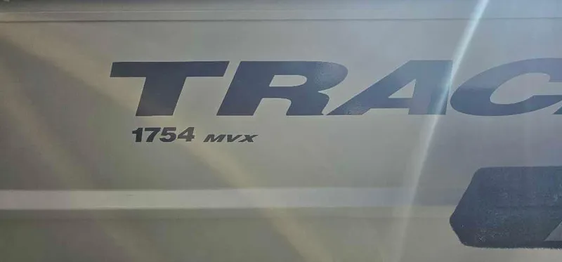 Slide: The Image of 2024 Tracker Grizzly 1754 Jon boat side view with model number. - 2