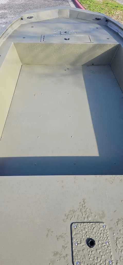 Slide: The Image of 2024 Tracker Grizzly 1754 Jon boat interior, spacious and durable design. - 4