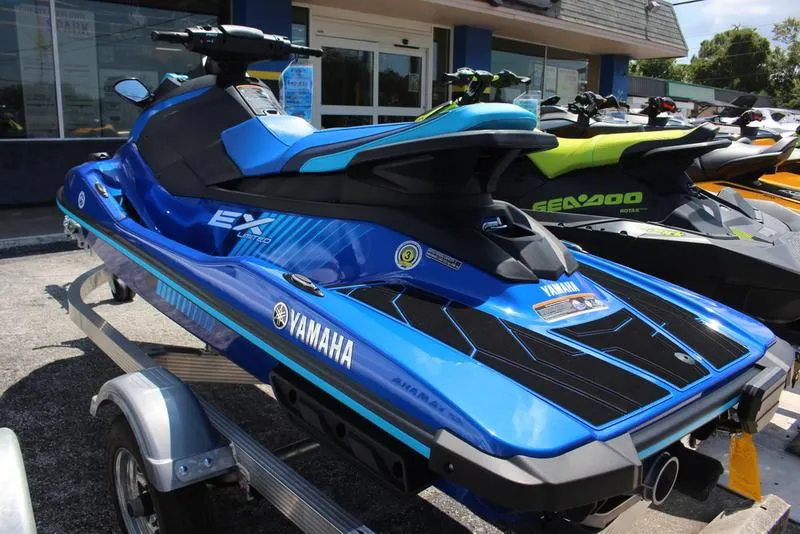 Slide: The Image of 2023 Yamaha WaveRunner EX Limited in blue on a trailer. - 2