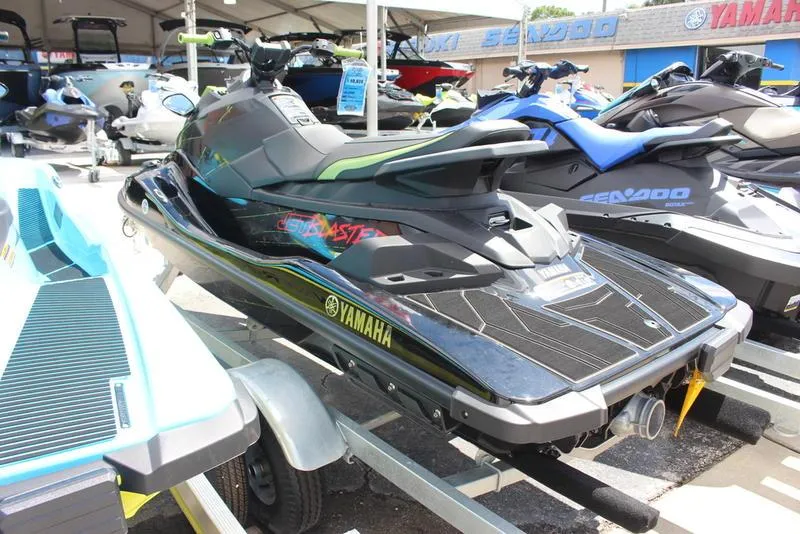 Slide: The Image of 2023 Yamaha WaveRunner JetBlaster on display at a dealership. - 2
