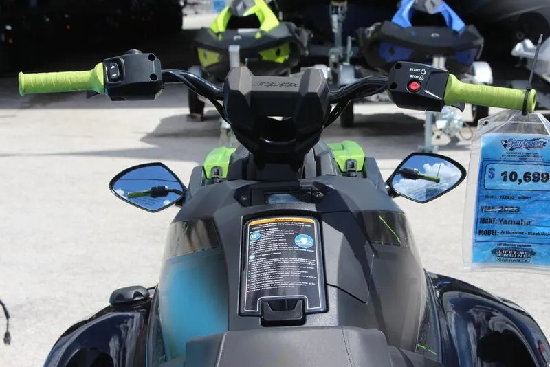Slide: The Image of 2023 Yamaha WaveRunner JetBlaster, green handlebars, rear view, price tag visible. - 5