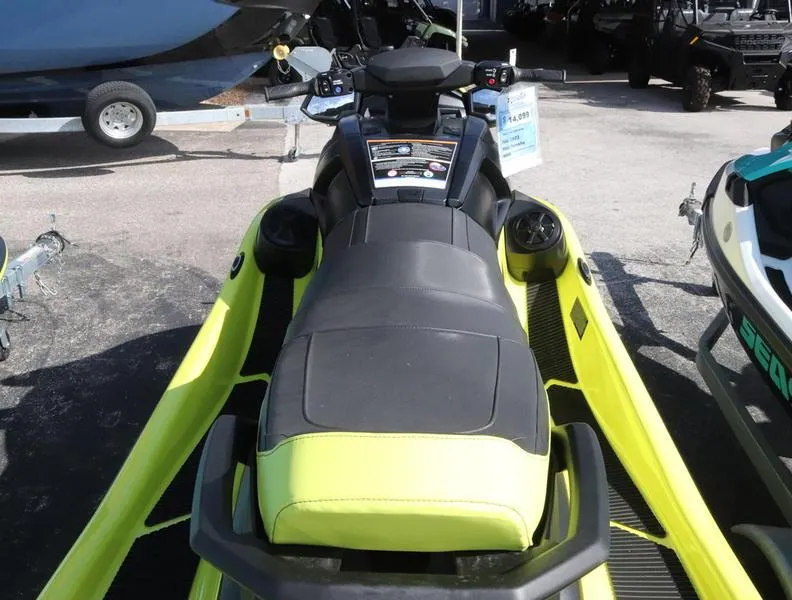 Slide: The Image of 2023 Yamaha WaveRunner VX Cruiser HO, lime green and black, rear view. - 4