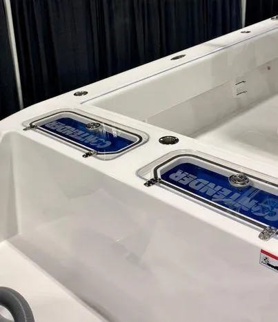 Slide: The Image of 2024 Contender 32 ST boat interior with storage compartments. - 4