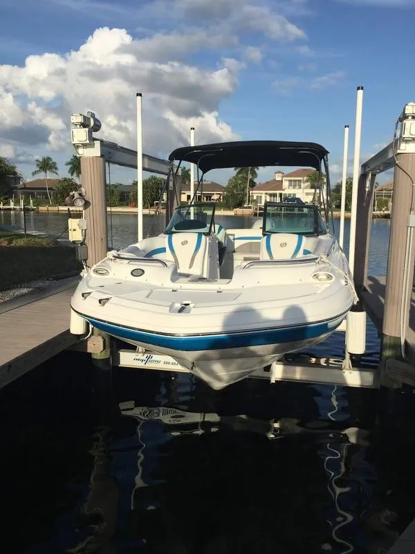 Slide: The Image of 2019 Godfrey Hurricane SD2200 boat docked at marina. - 0
