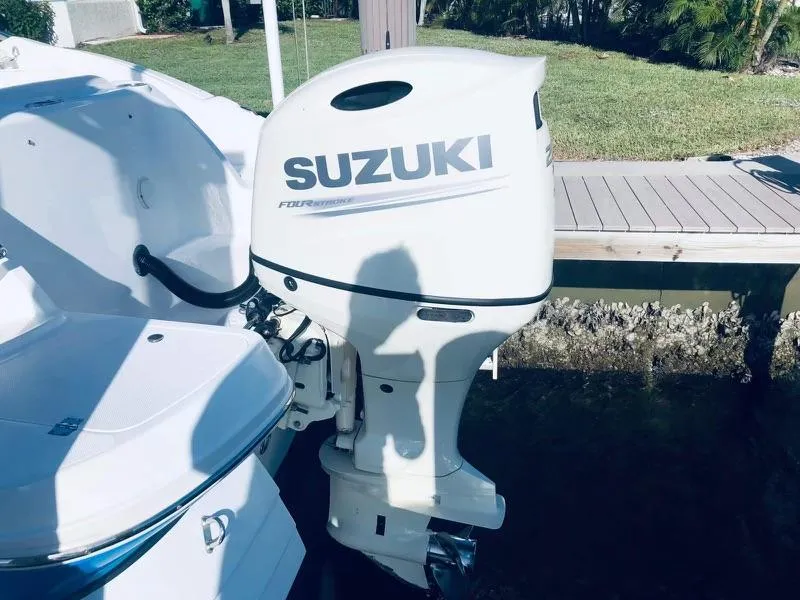 Slide: The Image of 2019 Godfrey Hurricane SD2200 boat with Suzuki outboard motor. - 12