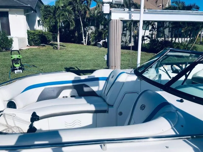 Slide: The Image of 2019 Godfrey Hurricane SD2200 boat interior with white and blue seating. - 3