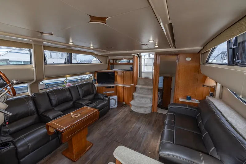 Slide: The Image of Luxurious interior of 2004 Meridian 459 Motoryacht with leather seating and modern amenities. - 21