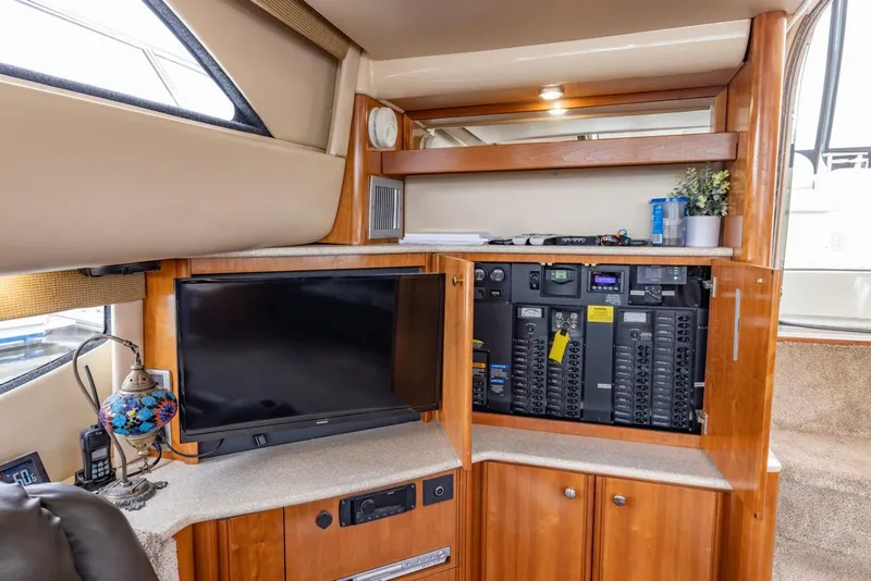 Slide: The Image of Interior of 2004 Meridian 459 Motoryacht with TV and control panel. - 25