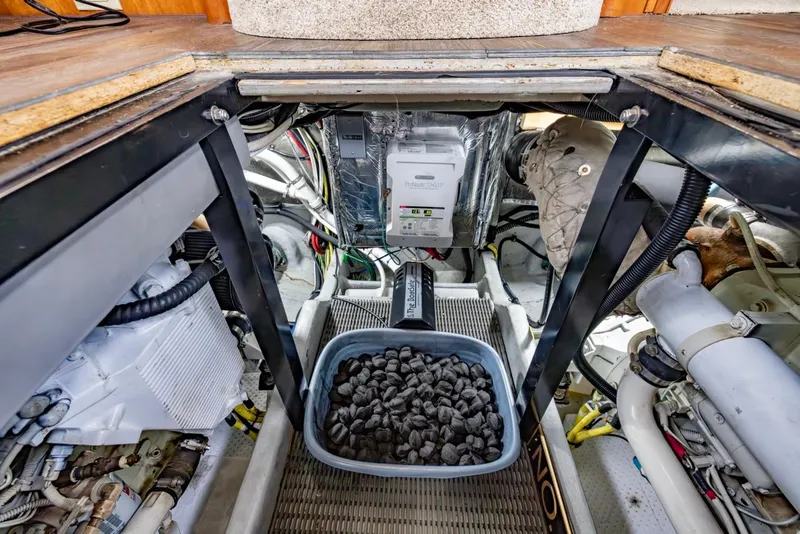 Slide: The Image of Engine room of 2004 Meridian 459 Motoryacht with equipment and maintenance tools. - 44