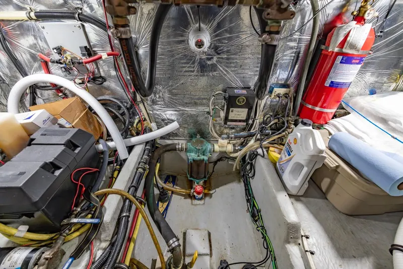 Slide: The Image of Engine room of 2004 Meridian 459 Motoryacht with equipment and wiring. - 45