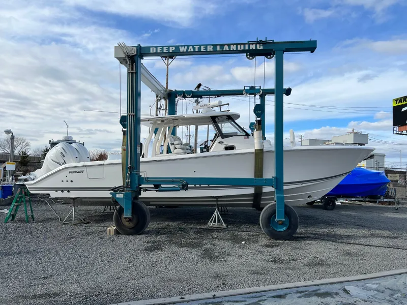 The Image of 2022 Pursuit S 358 boat on lift at Deep Water Landing. - 0