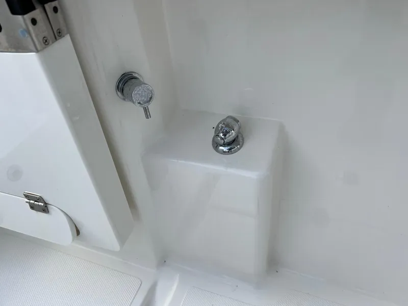 Slide: The Image of 2022 Pursuit S 358 boat interior detail with chrome fixtures. - 45