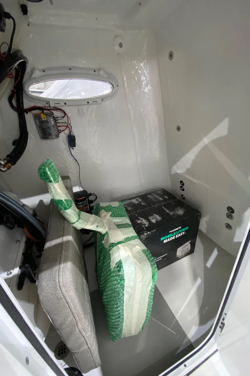 Slide: The Image of Interior of 2024 Sea Pro 202 boat with seating and equipment. - 11