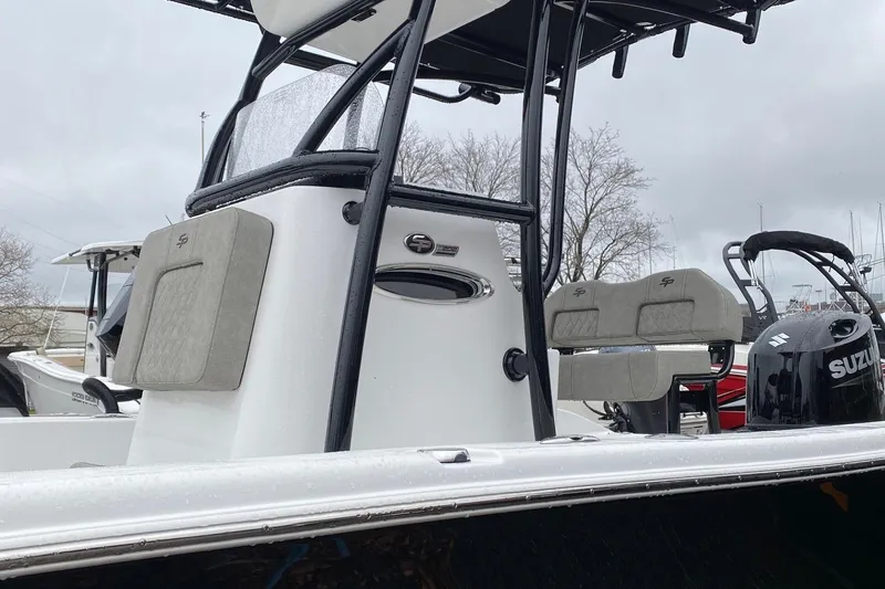 Slide: The Image of 2024 Sea Pro 202 boat with Suzuki engine, featuring sleek design and comfortable seating. - 16