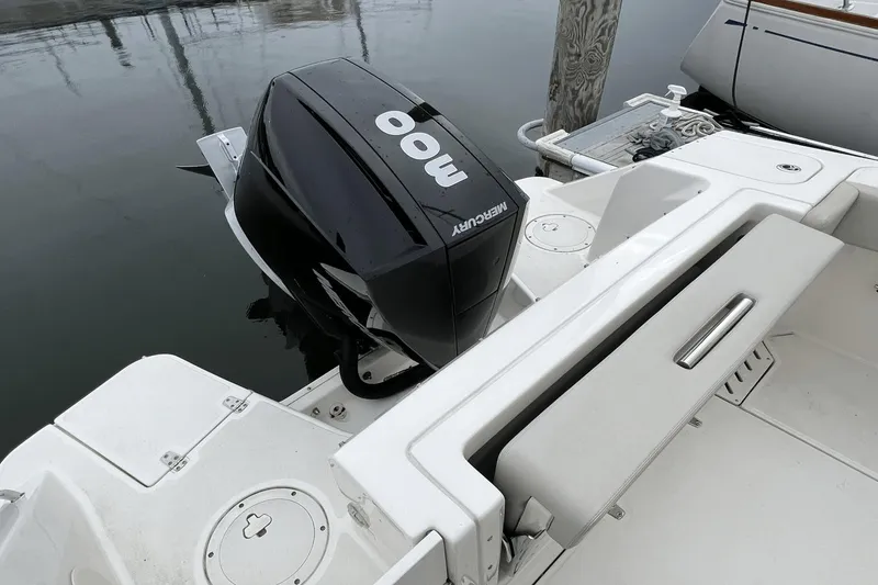 Slide: The Image of 2022 Boston Whaler 240 Vantage with Mercury 300 outboard engine at dock. - 20