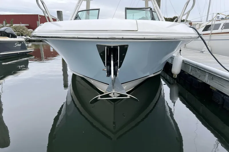 Slide: The Image of 2022 Boston Whaler 240 Vantage boat docked, front view with anchor. - 26