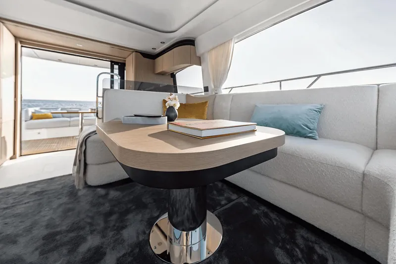 Slide: The Image of Luxurious interior of 2024 Azimut 53 Fly yacht with elegant seating and modern decor. - 25