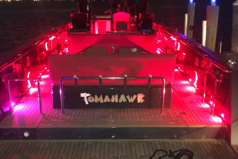 Slide: The Image of Fjord Express 2008 boat with red LED lights, docked at night. - 16