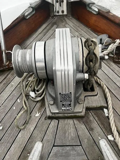 Slide: The Image of 1970 Cheoy Lee Offshore 40 helm with compass, Raymarine, and Garmin navigation systems. - 8