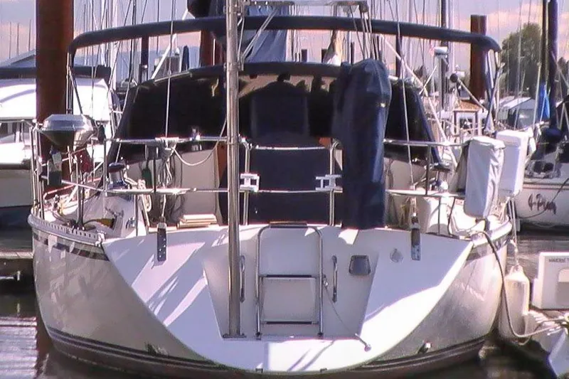 Slide: The Image of Sailboat docked at marina, Caliber 40 model, 2002. - 21