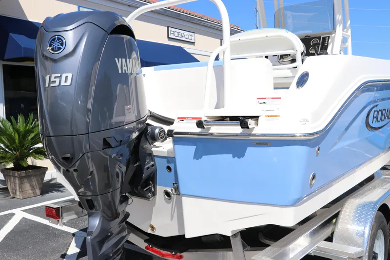 Slide: The Image of 2024 Robalo R202 EX boat with Yamaha 150 outboard motor. - 5