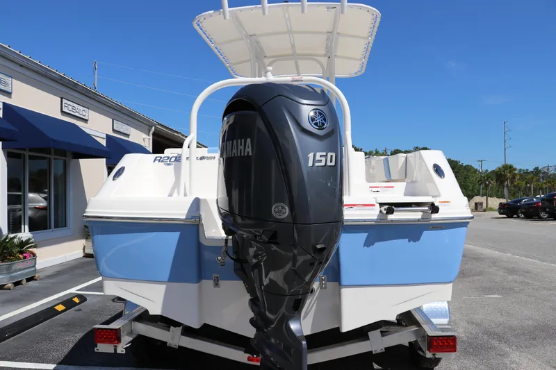 Slide: The Image of 2024 Robalo R202 EX boat with Yamaha 150 outboard motor, rear view. - 7