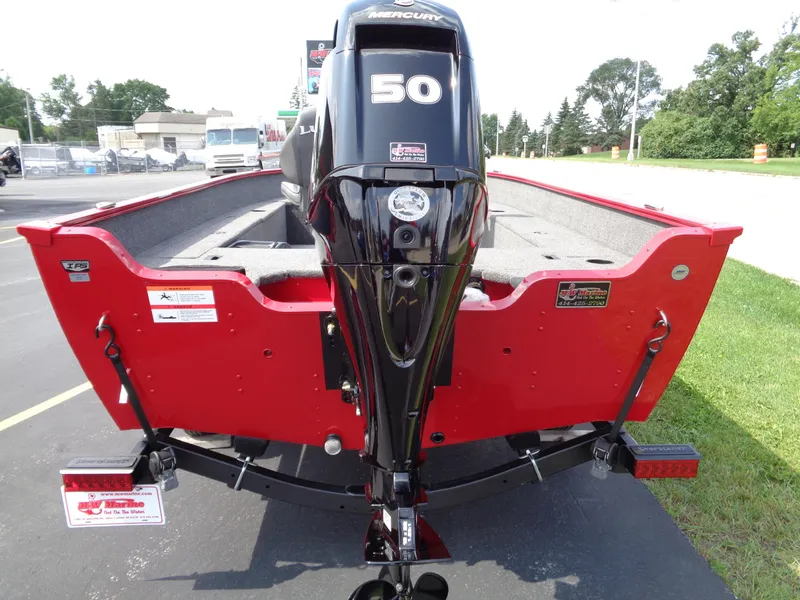 Slide: The Image of 2024 Lund 1650 Angler boat with Mercury 50 engine, red exterior. - 10